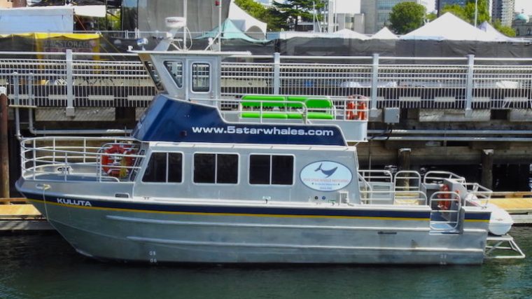 a boat is docked in the water